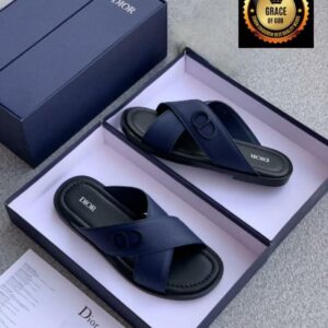 High-class navy blue Dior sandals in a box, showcasing luxury and comfort for the elite in Nigeria.