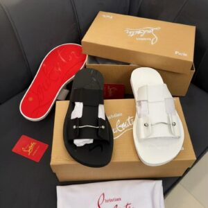 Luxury Christian Louboutin sandals in black and white, displayed with box and accessories, epitomizing high-class products for the elite in Nigeria.