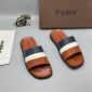 Luxury Pedro slides with brown, navy blue, and white straps, presented with a brown box and silver elephant figurine on a grey background | Levonteluxe